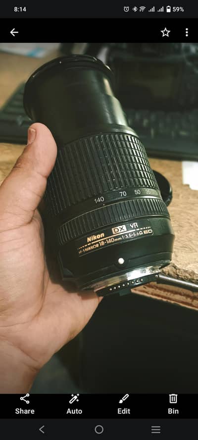Nikon AF-S DX NIKKOR 18-140mm f/3.5-5.6G ED VR camera lens.