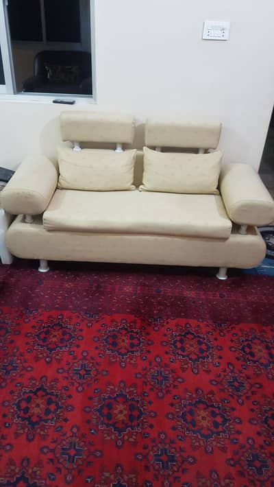 2 seater sofa with cover  beach color used