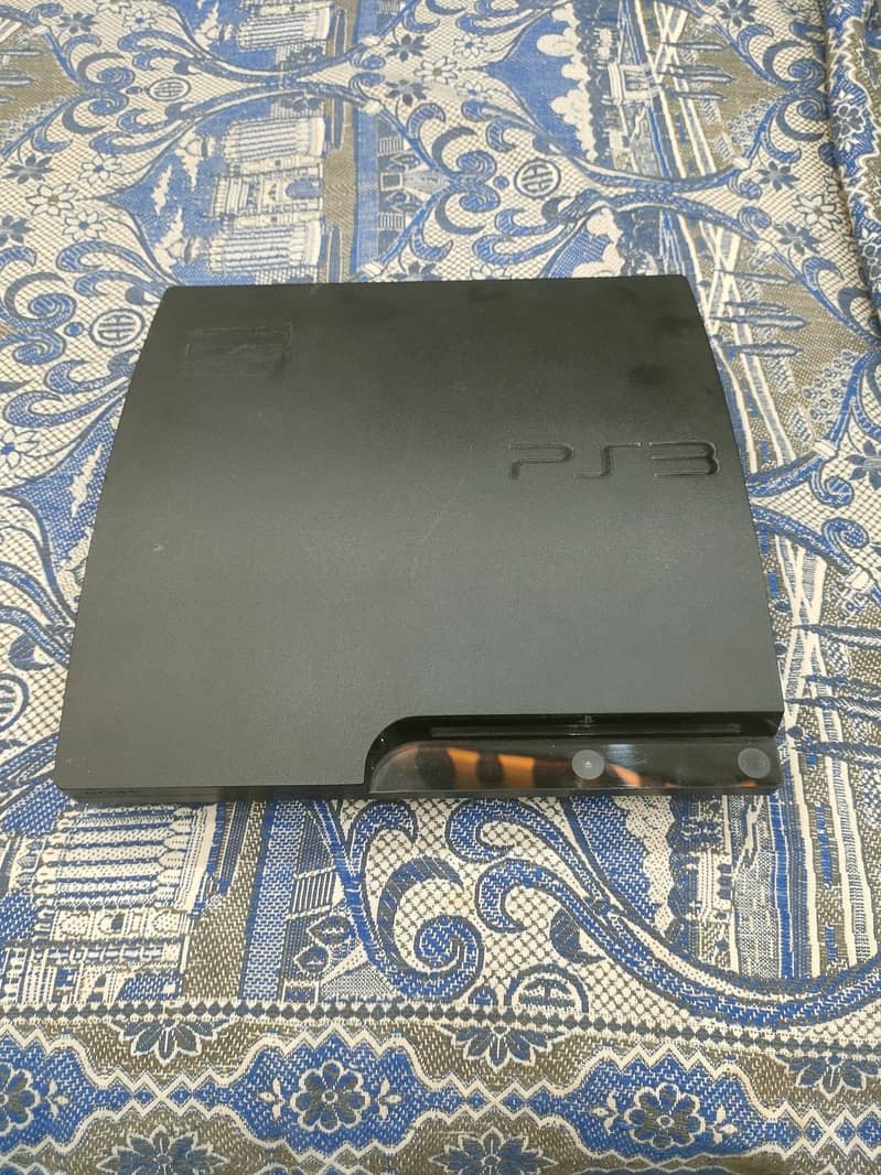ps3 slim with games 3 controller 1