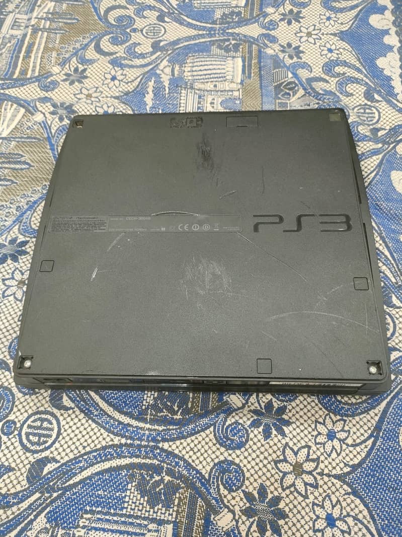 ps3 slim with games 3 controller 3