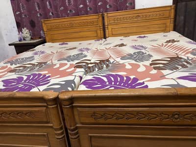 2 wooden beds with mattress for sale