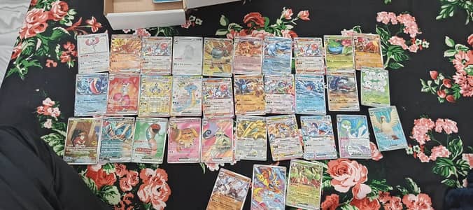 128 POKEMON cards With 61 FOOTBALL CARDS bought in england