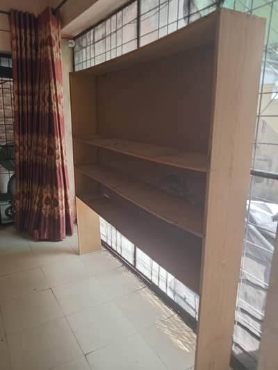 Wooden chip board rack 8 x 1 feet.