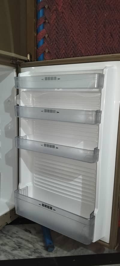 Dawalance fridge light golden colour 1 Year used scratch less fridge