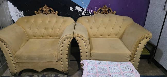 golden color sofa set