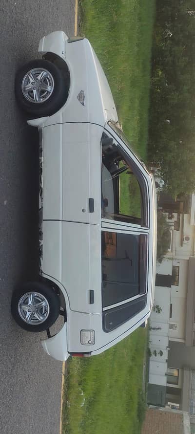 Suzuki Mehran VX 2009 model indrive mazdori