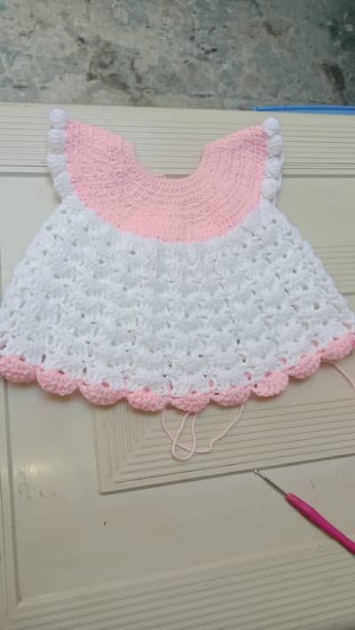 hand made chrochet baby girl frock to keep your baby warm