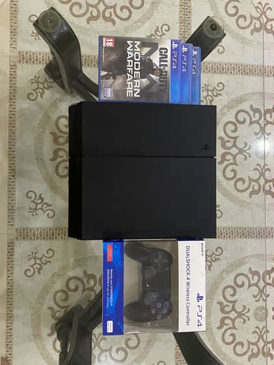 PS4 1200 series with games never repaired brand new condition