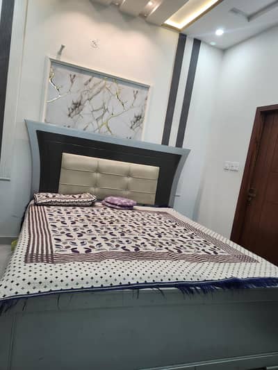 wooden double bed in excellent condition