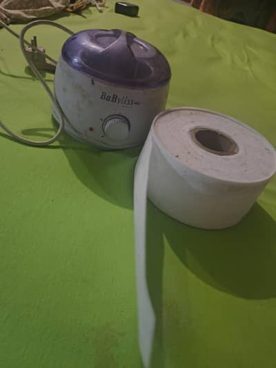 wax heating machine with 1.5 rolls of wax