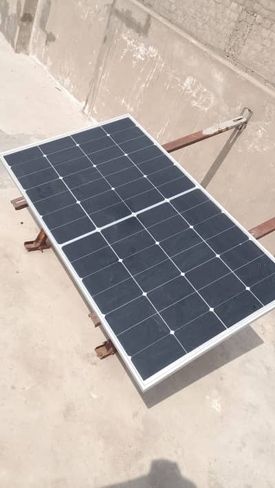 Solar panel with battery charger and bulbs