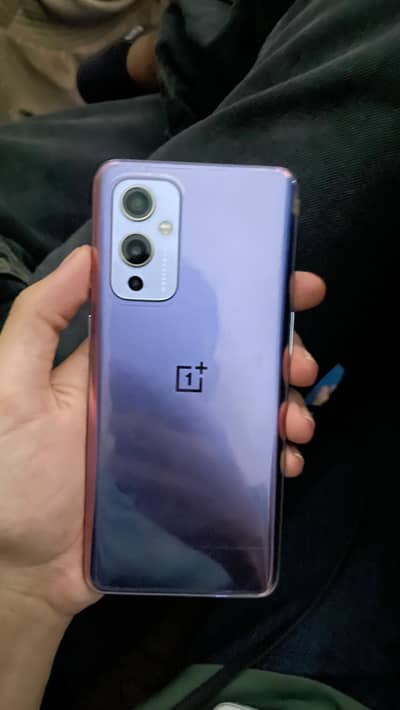 One Plus 9 with box and charger