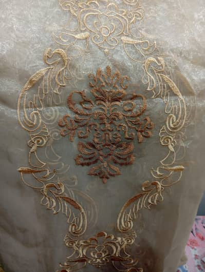 two curtain colour Brown organza embroidery condition 10 by 9 10