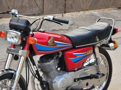 Honda 125cc        ,03081612776
