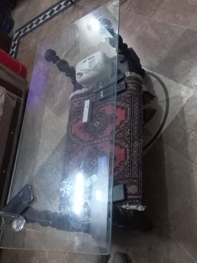 Wooden table with glass top for urgent sale