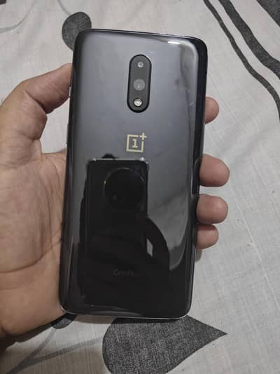 One Plus 7, 8/256, new condition.