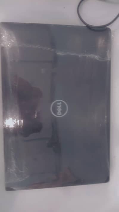 breand Dell with charger