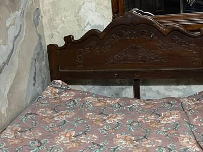 full hard wooden bed