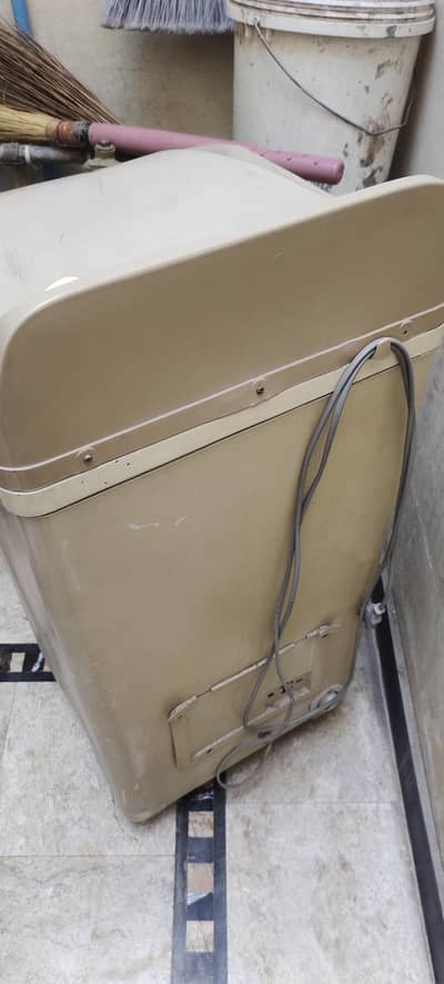 One Washing Machine RS. 7000 & One Dryer Rs. 7000