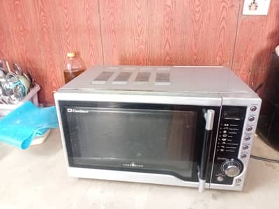 Title: Dawlance Microwave Oven DW-294S – 700W – Good Working Condition