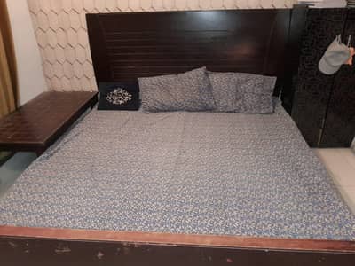 double bed, dressing table and table