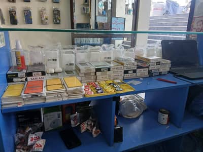 Mobile, Laptop Repairing plus Accessories and Photo Studio