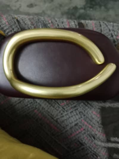 brand new Zara maroon oval clutch handbag