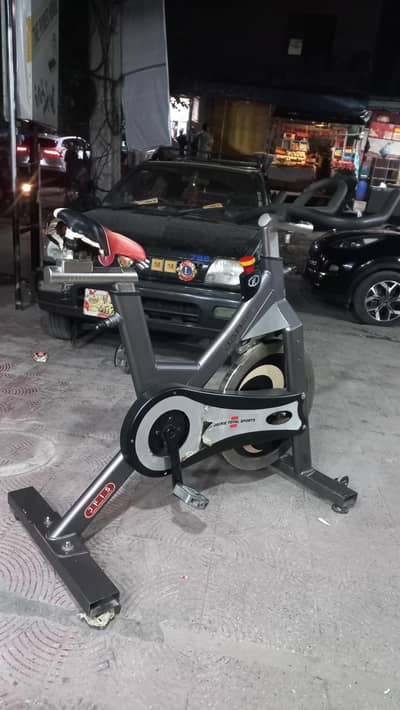 Branded commercial steel wheel spin bike spinner cycle exercise bike
