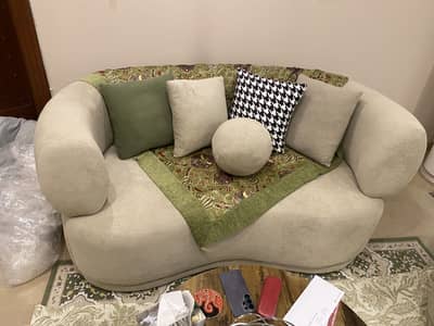C shape sofa with revolving chairs