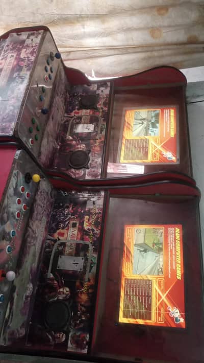 2 Video Game and 1 badawa for sale