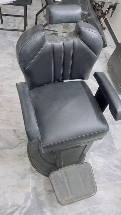 One cutting chair. One washing unit. One facial bed