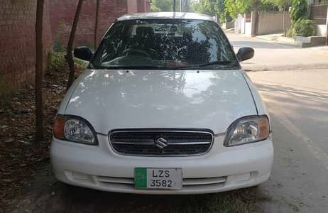 Suzuki Baleno 2005 jxr white excellent condition
