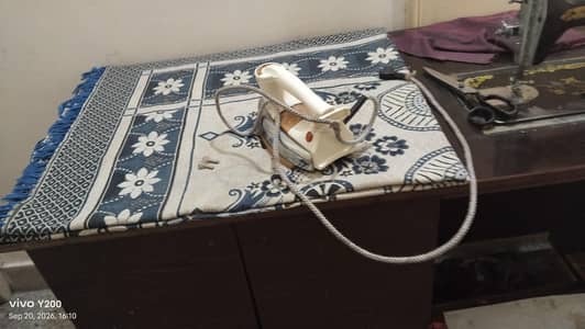 Title: Sturdy Wooden Table for Sale (Ideal for Ironing & Sewing)