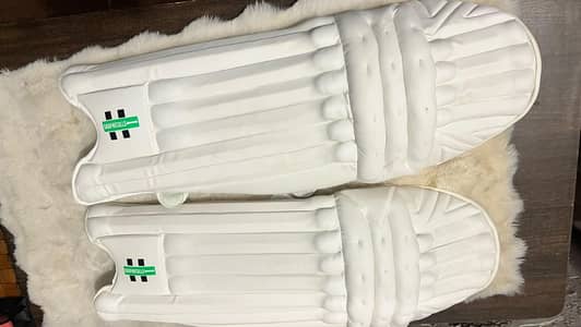 HARD BALL CRICKET LEG PADS GREY NICOLLS VERY VERY GOOD CONDITION.