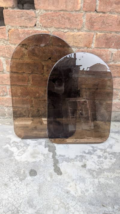 Arched, bronze-tinted glass