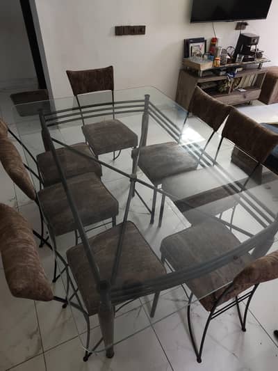 Rod iron dining table 8 seater with glass top