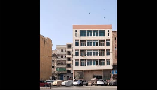 Defence Phase V Badar 200 Square Yards Commercial Building for Sale.