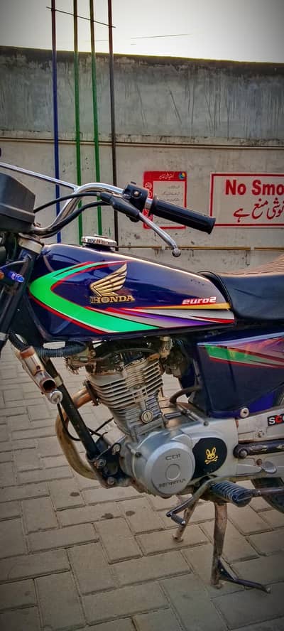 Honda 125 blue addition