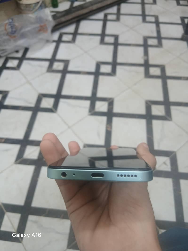 Tecno Spark Go 1 2
