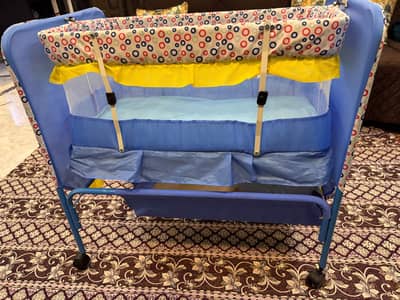 baby cot and swing