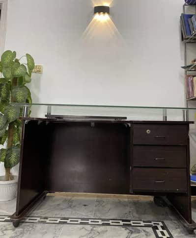 Executive glass-top office table with drawers