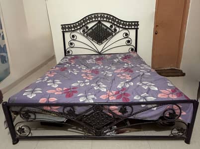 Iron bed with mattress
