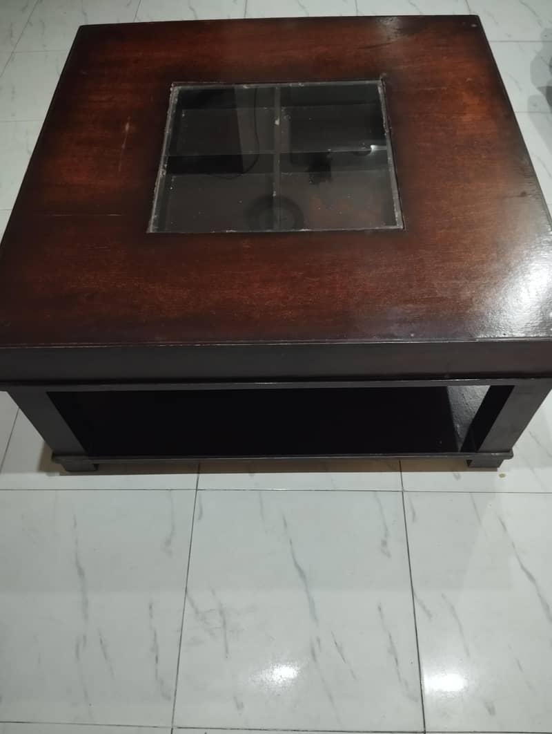 One Centre Table . . . 1