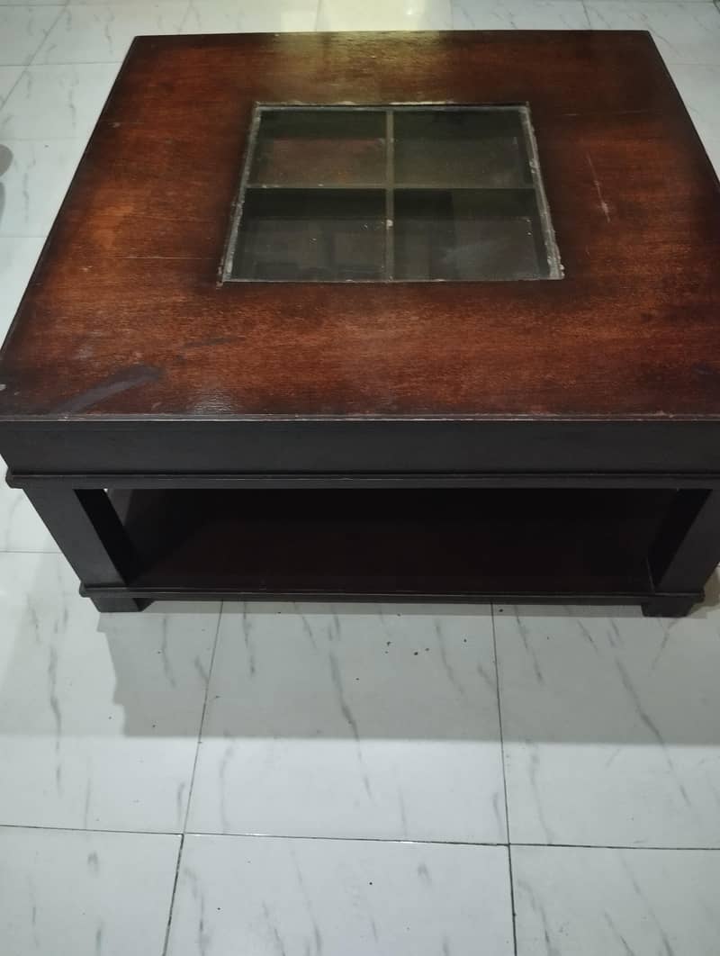 One Centre Table . . . 2