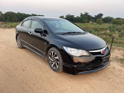 Honda Civic VTi 1.8 (manual transmission).