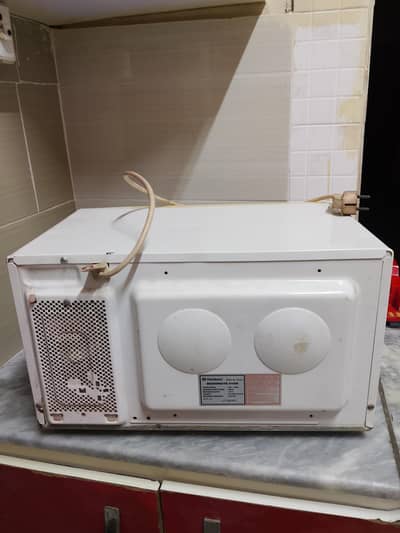 microwave oven ok condition 10 by 9