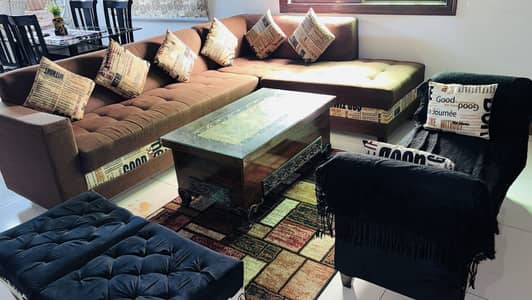 Slightly used modern black and brown L shape 9 seater