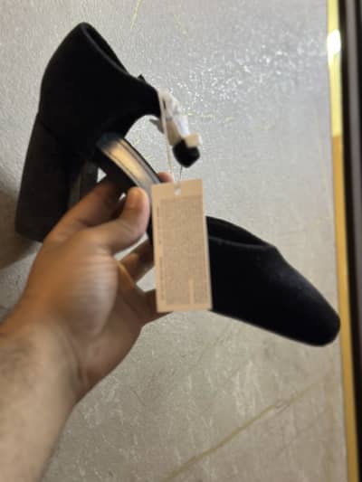 Black valvet shoe pair