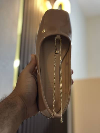 Tea pink lama shoes pair