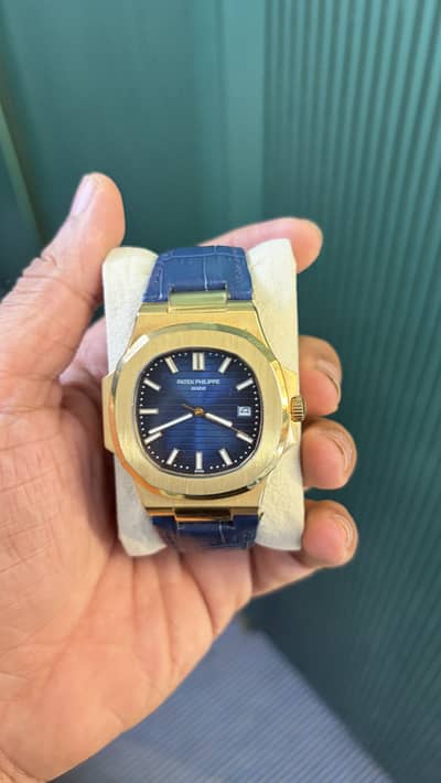 Patek Philippe Geneve Golden Dial & Blue Strap Watch